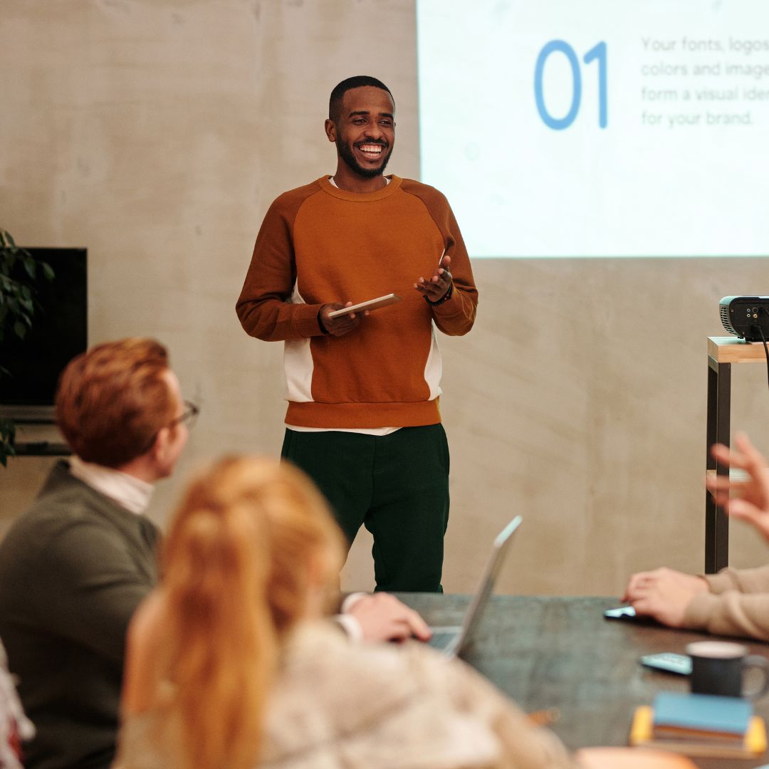 Agency leader presenting operational results to a team
